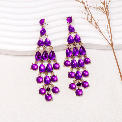 Elegant purple chandelier earrings with cascading teardrop design for stylish outfits