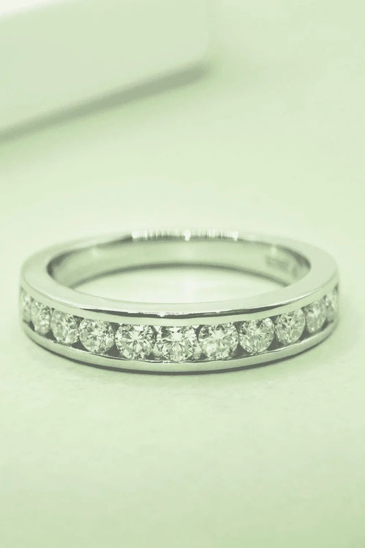 Trendsi silver moissanite wedding band featuring a sleek design and sparkling stones