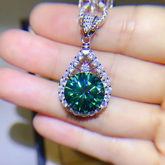 Elegant Teardrop Moissanite Pendant with a Sparkling Green Gemstone and Fine Silver Detailing