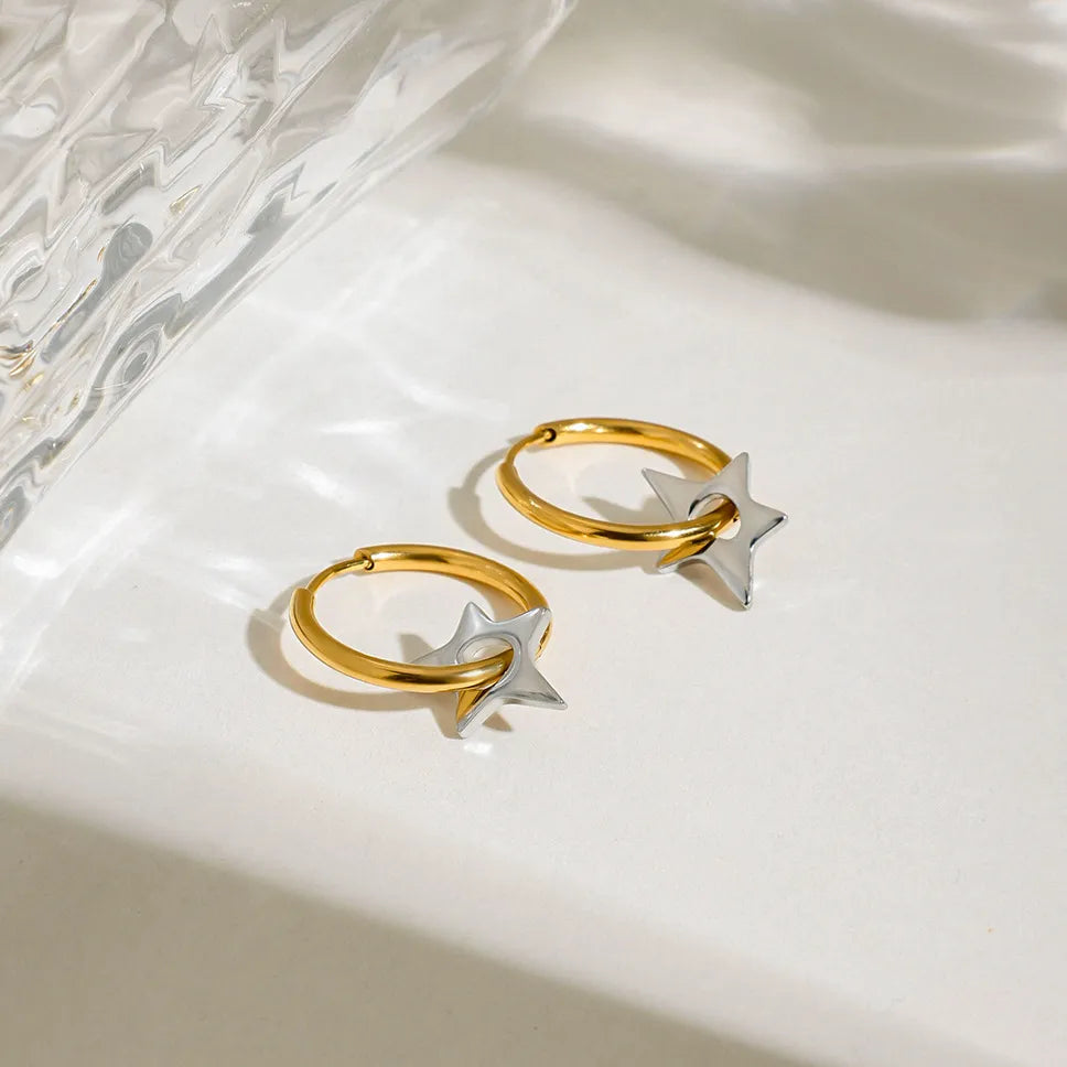 Trendsi two-tone star hoop earrings with a gold and silver finish for stylish accessory lovers