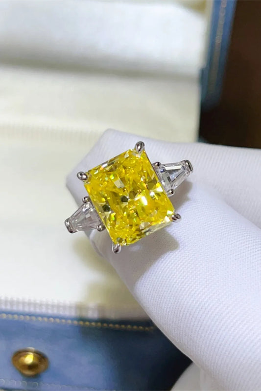 Stunning unique engagement ring moissanite with a yellow center stone and side accents