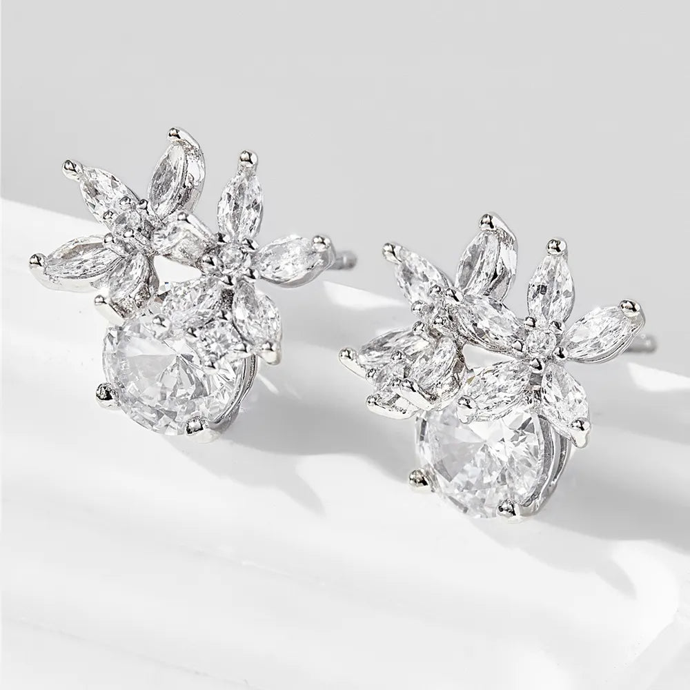 Trendsi zircon flower stud earrings featuring sparkling zircon gemstones in a floral design