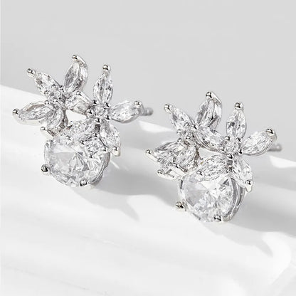 Trendsi zircon flower stud earrings featuring sparkling zircon gemstones in a floral design