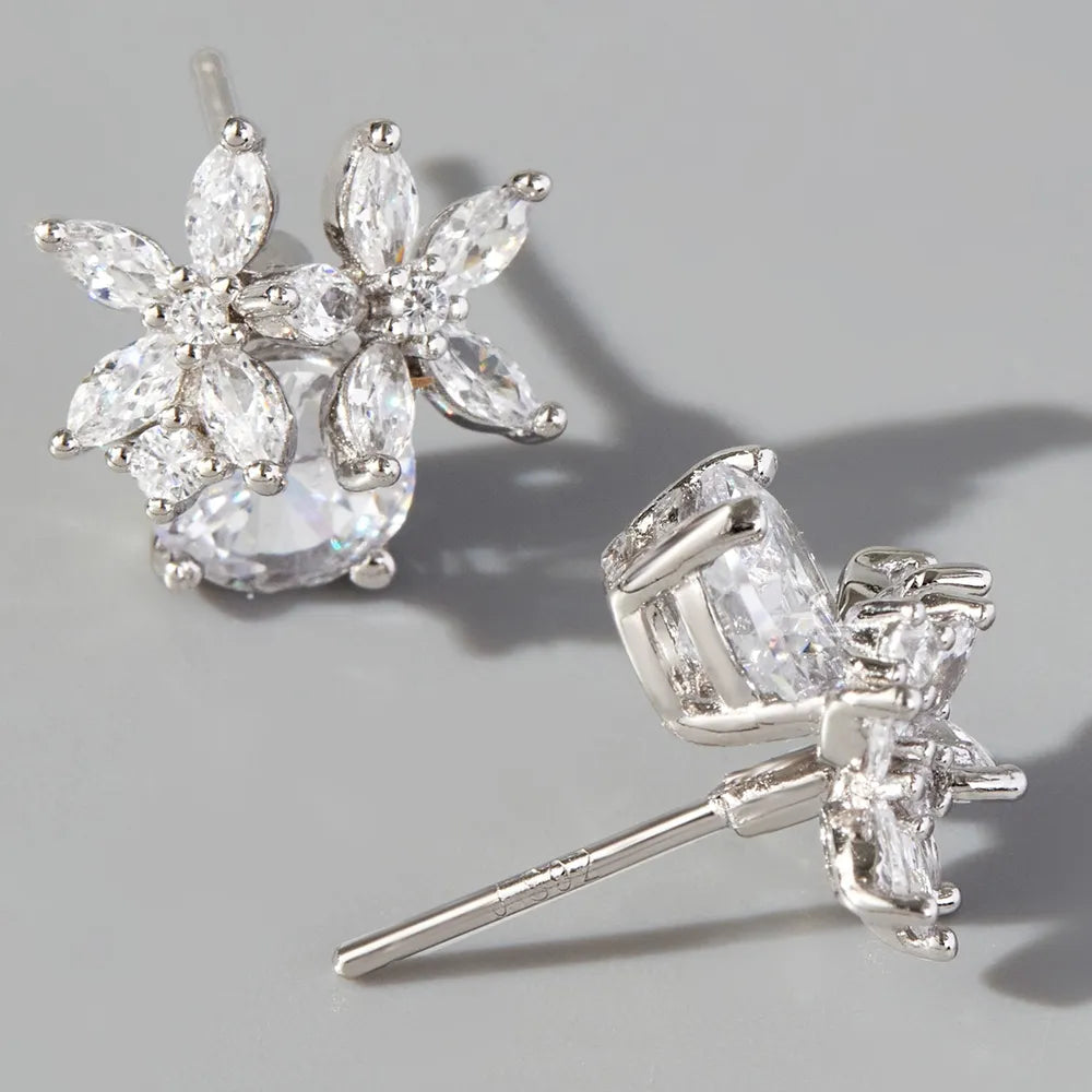 Trendsi zircon flower stud earrings featuring a floral design with sparkling crystals